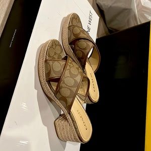 Like NEW! Only worn 1x.. Coach heeled sandals.